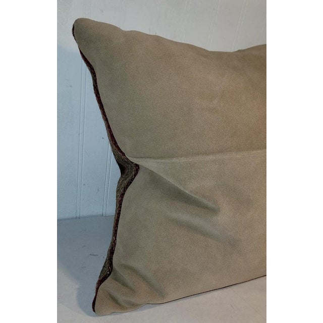 20Thc weaving pillow in wind mill blades pattern. The insert is down & feather fill. beautiful Leather backing. Nicely...