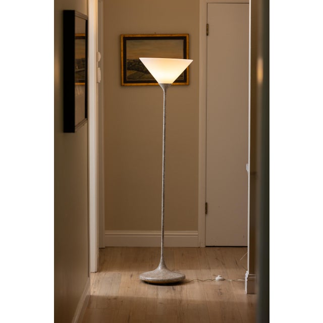 Sculptural torchiere floor lamp by Koch + Lowy, made in the USA circa 1970s–early 80s. Features a tulip-style cast metal...