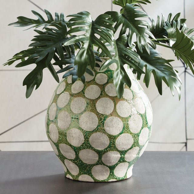 In a nod to midcentury pottery, this fun, fashion statement makes a memorable centerpiece. Fill with faux blooms, or leave...