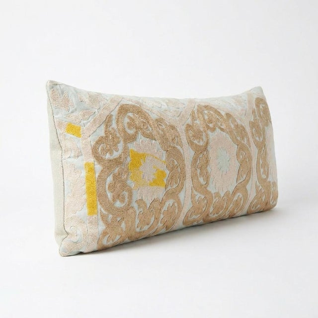 This beautiful 16'' x 39'' hand-embroidered Suzani pillow cover was made from authentic Uzbek cotton fabric. The intricate...