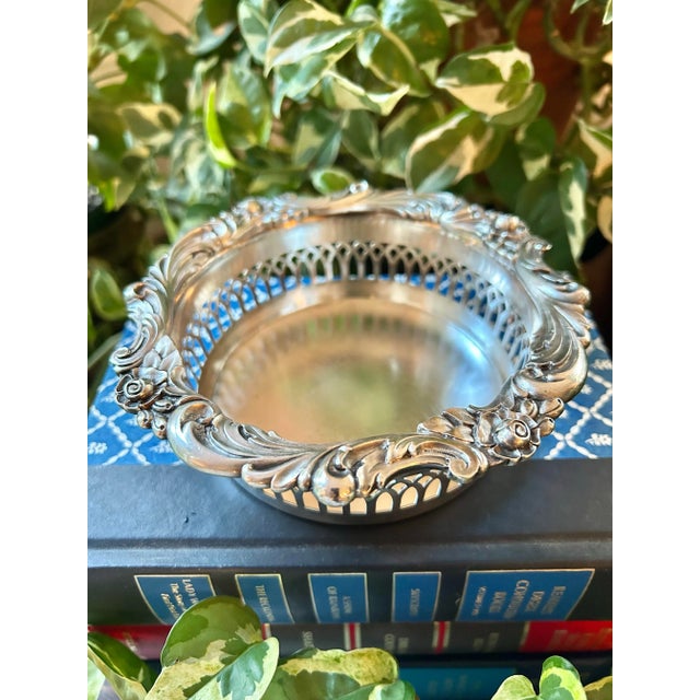 Add vintage charm to your home bar setting or table top with this silver plate wine coaster. The “Eloquence” pattern by...