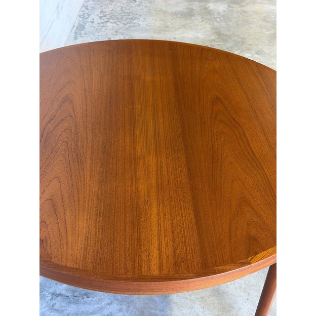 Brown Dyrlund Lotus Round Teak Dining Table With Flip-Out Extension Leaves – Vintage Danish Mid-Century Modern For Sale - Image 8 of 12