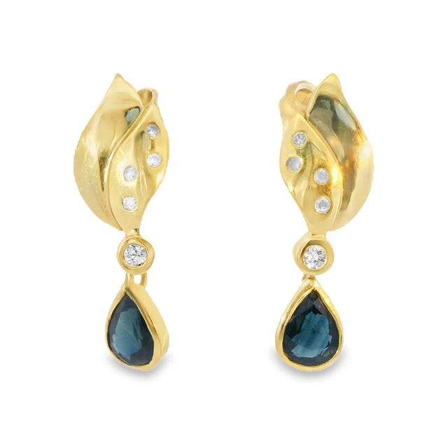 Elevate your style with this exquisite Estate 14K Yellow Gold Drop Earrings with Sapphire and Diamonds . These stunning...