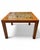 Outstanding Mid-Century Modern period teak end table with tiled top. The tiles are patterned with circles and squares and...