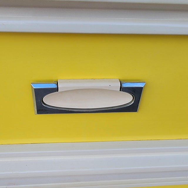 Pair of Space Age Mid Century Nightstands Yellow White Lacquer nightstands Not marked. Measure approx. 26" wide x 15" deep...