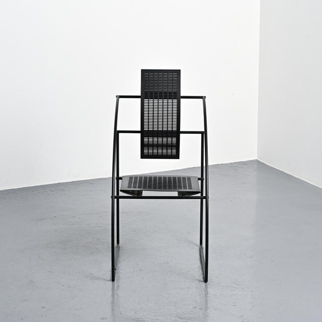 Model 605 chair, also known as Quinta, by Italian designer Mario Botta. Black lacquered steel frame, seat and backrest in...
