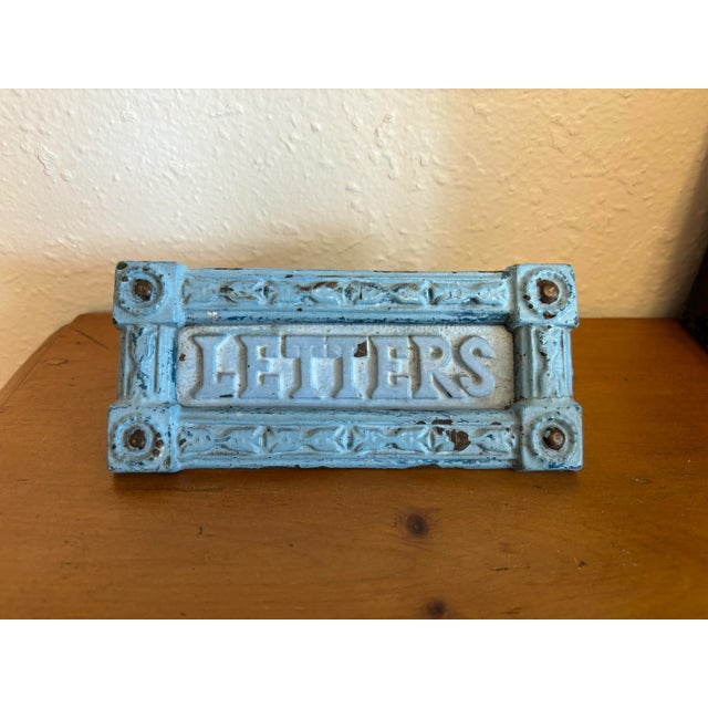 A delightful 19th century cast metal letter slot. Lovely detail and font. Hand selected in and imported from England.