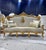 Elevate your home with this stunning Baroque-style French sofa. Upholstered in luxurious beige-tan damask fabric and...