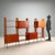 Vintage 1960s bookshelf with a freestanding design, ideal for placement even in the center of a room. Made of teak veneer...