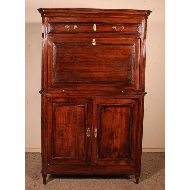 Surprising and rare Louis XVI secretary in cherrywood from the 18th century. Uncommon secretary given its large size of 1...