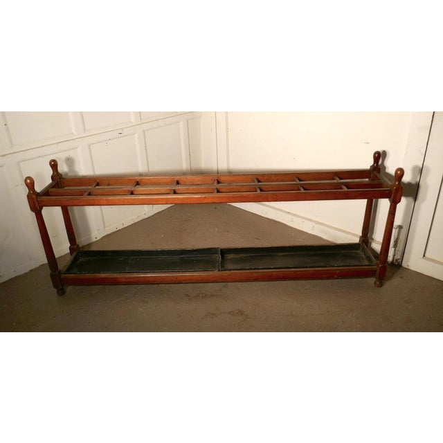 A very long pitch pine stick or umbrella hall stand This is a very long umbrella stand, it is made in pitch pine with a...