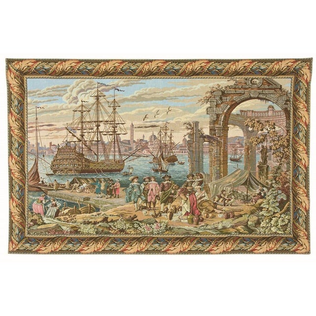 This tapestry represents a 17th Century view of the ancient port of Venice in Italy. In a busy quayside scene, local...
