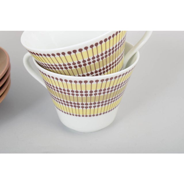 Rörstrand "Mandarin", set of four teacups with saucers. Decorative tableware designed in 1962 featuring the characteristic...