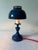 This is a Mid Century Modern 1960’s table lamp with tole painting red on blue. New red silk wiring. Original pieces and...