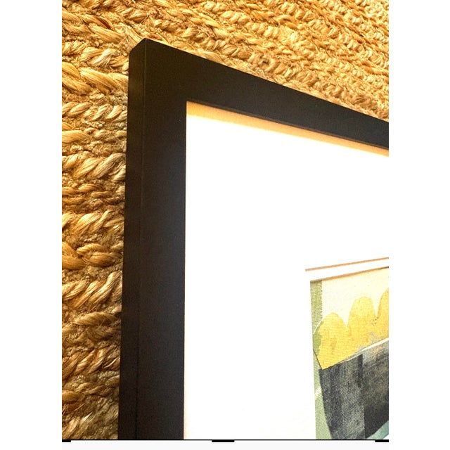 Mixed media collage (acrylic, canvas, paper) double matted in white bevel cut mats and framed behind glass in a 13.5 x...