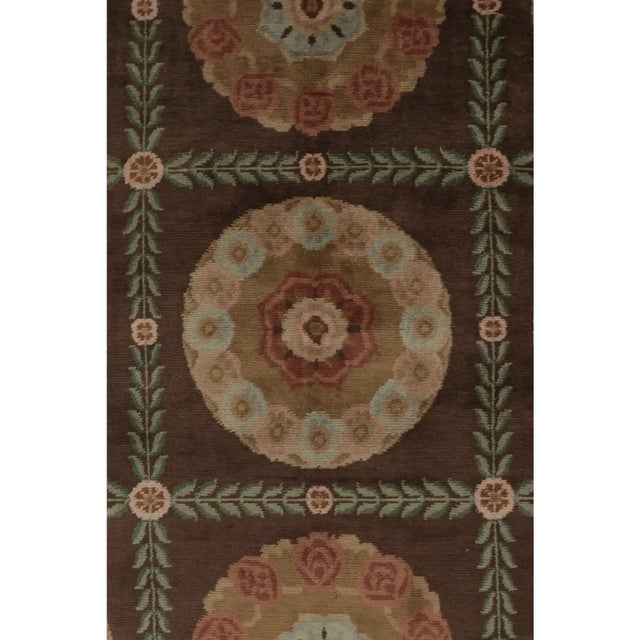 This contemporary 12x18 antique Aubusson inspired rug, handwoven in wool, reinterprets the elegance of eighteenth-century...