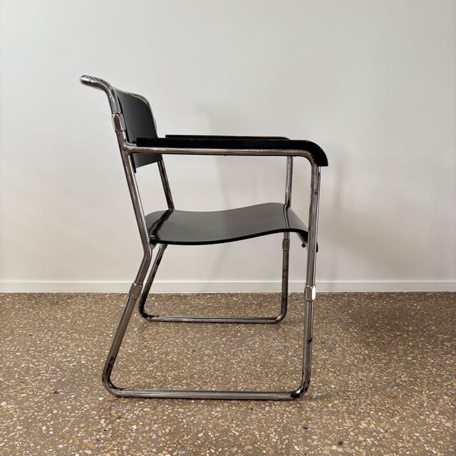 Very rare, hard to find chair with arm rests, model a r, design by hermann friedrich mertens (1885-1960) for ums pastoe in...