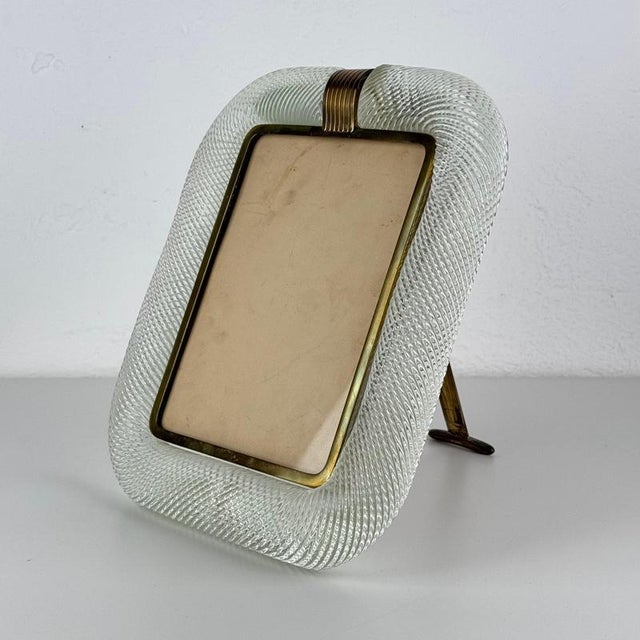 Important and sculptural picture frame produced by Barovier & Toso, Murano, dated 1938. A rare and refined example of...