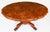 This is a lovely antique Victorian burr walnut tilt top loo table, circa 1860 in date. The shaped oval table top features...