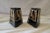Pair of triangular shaped ceramic candleholders by Harris Potteries, Chicago, IL. They are glazed with black and gold...
