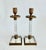 This rare pair of French Restoration period (circa 1820-1830) candlesticks beautifully blend classical elegance and...