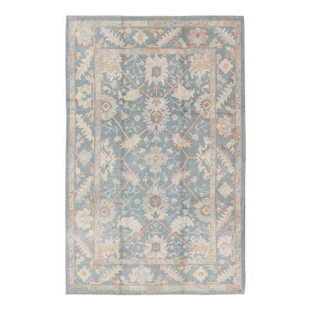 Turkish Oushak Rug With Floral Design in Light Steel Blue and Coral Accent For Sale