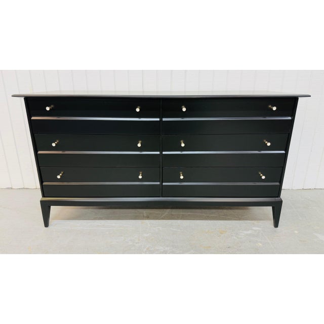 This listing is for a Mid-Century Modern Heywood Wakefield Black Lacquered Dresser. Featuring a straight line design, six...