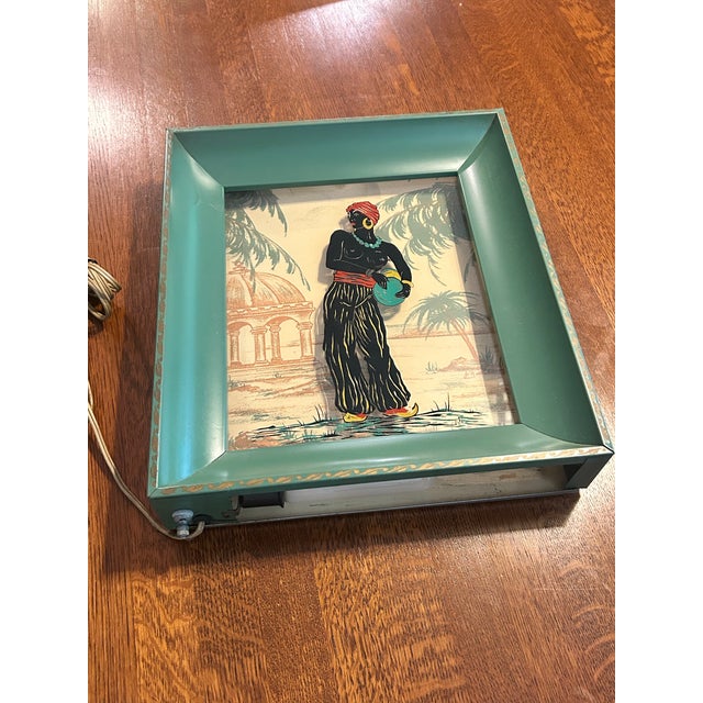 An exceptional and highly collectible piece of authentic 1950s Mid-Century Modern theatrical wall decor. This striking,...