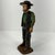 Pennsylvania Amish Man Sculpture as a Cast Iron Door Stopper, Early 20th Century. The sculpture is hand-painted in blue...