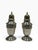 A highly elegant, complete pair of solid sterling silver salt and pepper shakers (muffineers) by the legendary American...