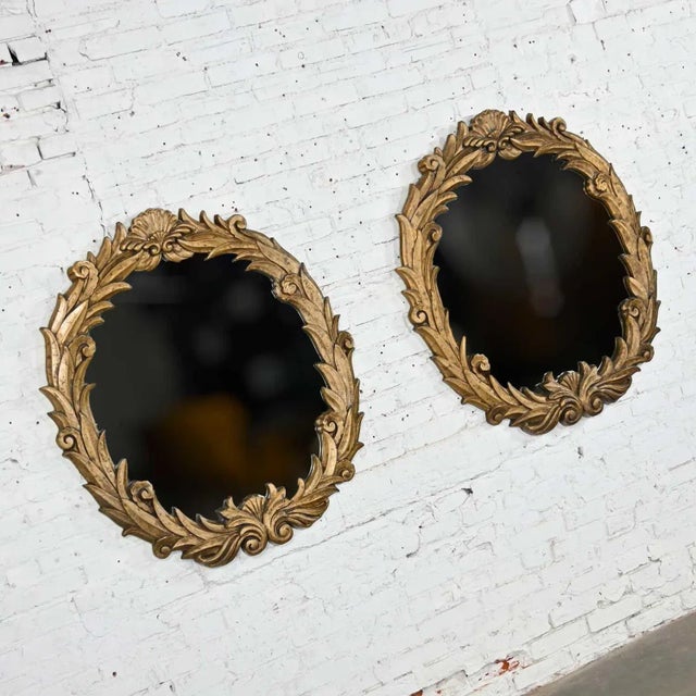 Amazing pair of Art Deco gilded resin mirrors with anthemion or foliate design in the style of Serge Roche. Beautiful...