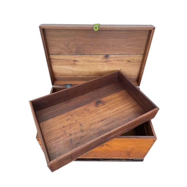 A vintage chest handmade from solid Burmese teak. This trunk was made in the 1990's in a small village about 100 km north...