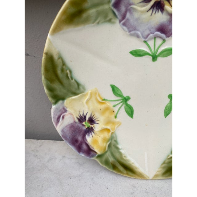 French Majolica plate with pansies signed Choisy Le Roi circa 1890.