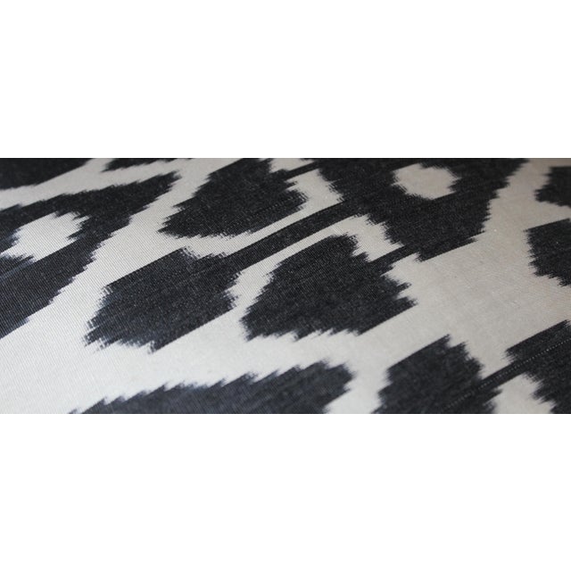 Bohemian silk ikat pillow with vibrant colors of red, beige and blue. Super hand soft. Pillow has a zipper for closure....