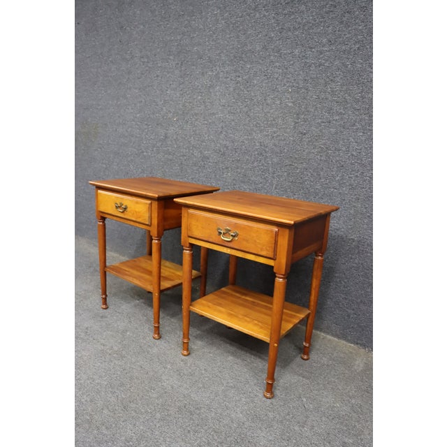 Pair of Cherry Valley Stickley nightstands by Leopold Stickley, featuring rectangular tops with molded edges, single...