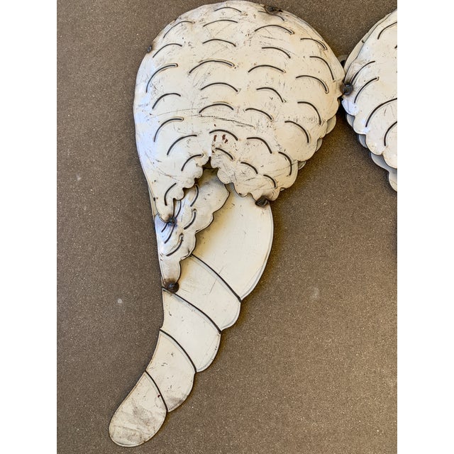 Large white metal angel wings wall sculpture made from reclaimed metal measures 32 tall x 21" across at the widest,...