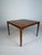 Original danish rosewood coffee table designed by johannes andersen (1903–1991) and manufactured by the renowned danish...