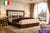 Bring refined Italian elegance to your bedroom with this sophisticated three-piece queen bedroom set, expertly crafted in...