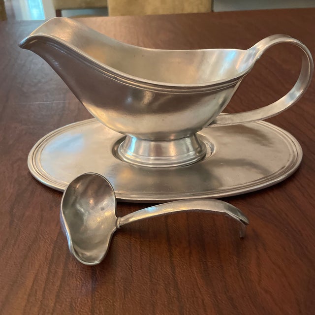 Arte Italica Pewter gravy bowl and ladle.