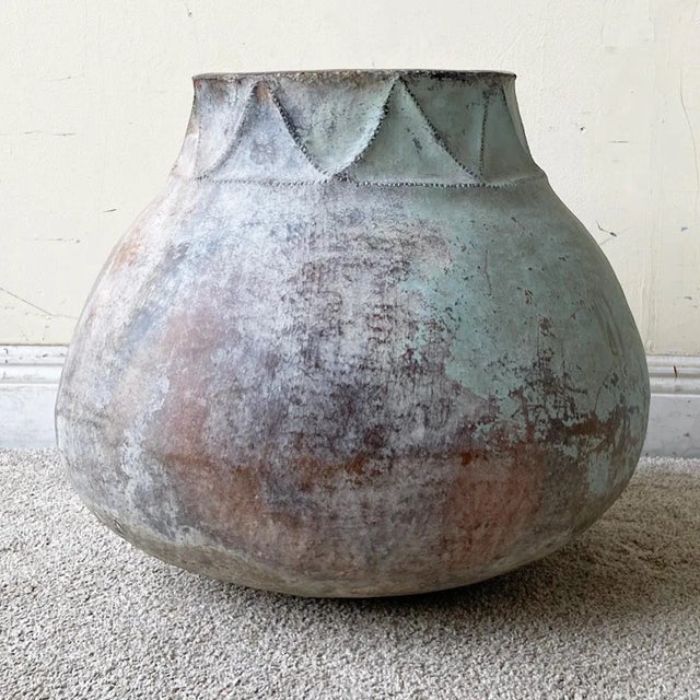 Exceptional large vintage Colombian hand made clay water container/jug. Displays a fantastic native influenced design...
