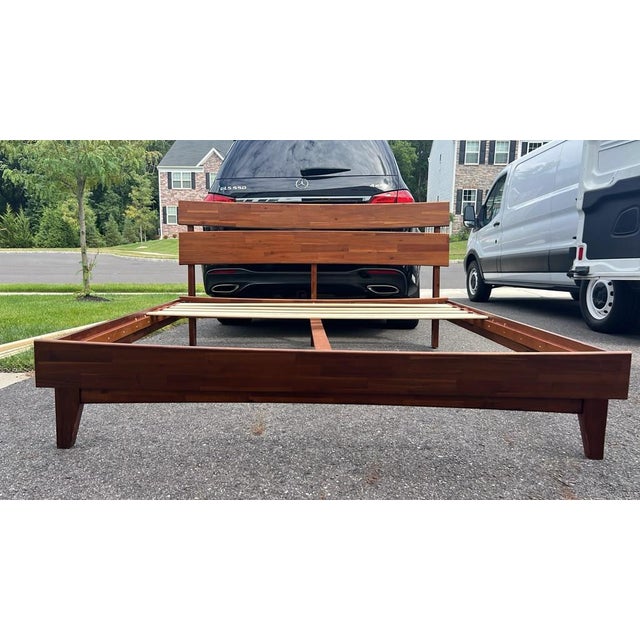 Beautiful Acacia Aurora solid wood King platform bed frame. Modern slatted headboard design with rich natural wood tones...