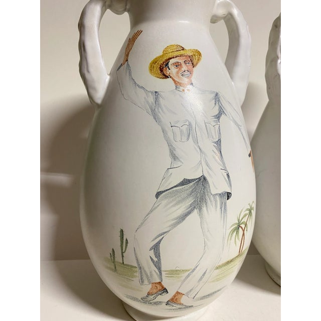 This is a truly wonderful pair of matched Italian pottery vases. They are signed alpha, made in Italy, with foil, Conny’s...