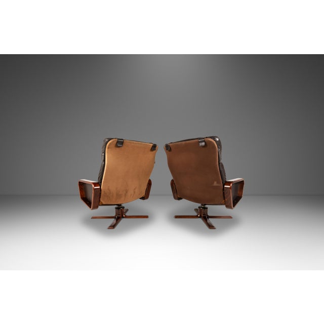 Introducing an extraordinary set of Scandinavian Modern lounge chairs with matching ottomans that is as comfortable as it...