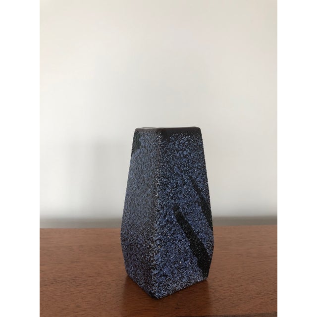 A vintage vase from Afina Rijnsburg- Netherlands. It has a great texture created by the fat lava glaze, and a bold graphic...