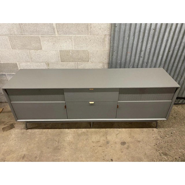 "Dang" 2 Door 2 Drawer Grey Media Stand Console Credenza by Blu Dot. Item features perforated steel door fronts, steel...