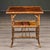 Found and made in England, this bamboo framed side table dates from the 1870s. Framed in tortoise or spotted bamboo with a...