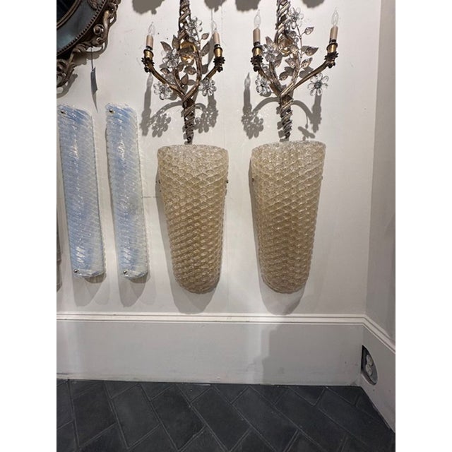 Lovely pair of Gold Murano glass sconces with ribbed glass. Creates a designer look! So pretty!