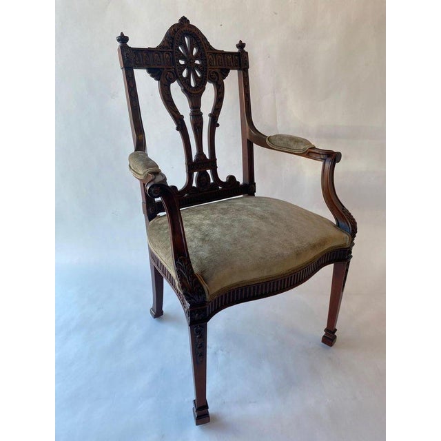Set of Twelve 19th Century English Edwardian Mahogany Dining Chairs. Consisting of two armchairs and ten side chairs,...