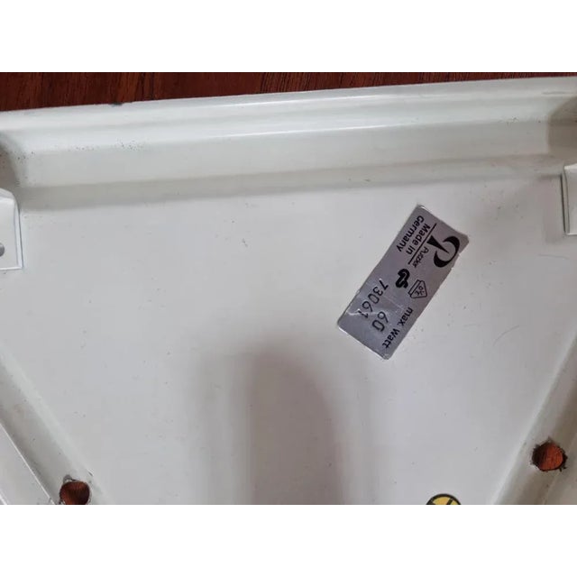 Very nice style of lighting. Rare type. Marked by labels. Wear consistent with age and use. This piece is attributed to...