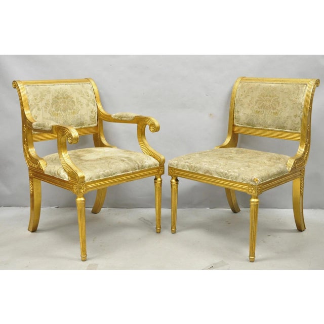 Neoclassical Regency Style Gold Carved Wood Dining Room Chairs - Set of 10 (Made in Spain). Set includes (8) side chairs,...